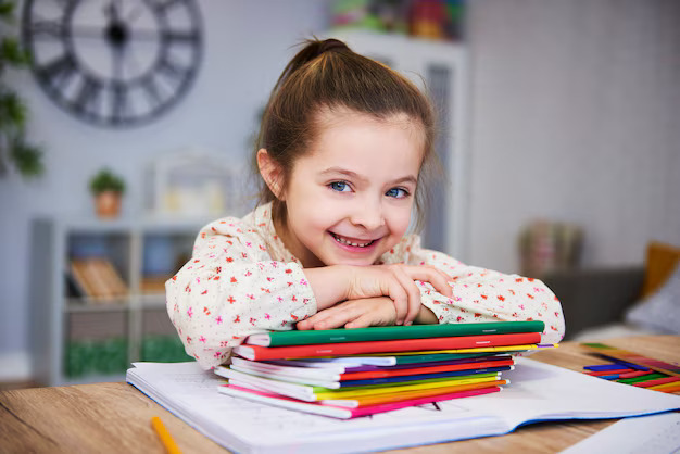 smiling-girl-studying-home_329181-18968 (1)